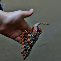 مجسمه طاووس و اسب