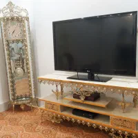 میز تی وی ساعت ایستاده برنز