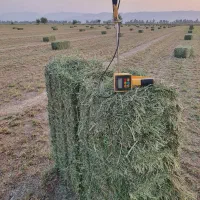 یونجه پرس و خرمن‌کوب شده