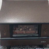 بخاری گازی شومینه در حد نو