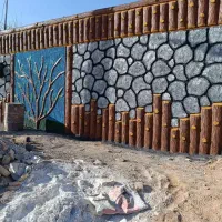 سیمان‌کاری‌طرح‌سنگ‌وچوب‌وچاه‌کنی‌وبنای