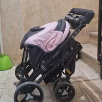 کالسکه و کریر صورتی|کالسکه و لوازم جانبی|تهران, فرودگاه مهرآباد|دیوار