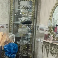 اینه شمعدان و ویترین و میز تی وی برنجی