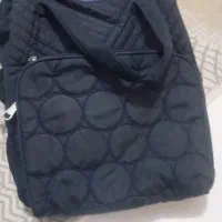 قنداق سوئیسی وکیف لوازم نوزاد