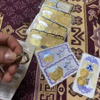 نیم سکه سکه پارسیان و انگشتر سولیتر