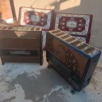 ۲عددبخاری۱۲۰۰۰و۶عدد پشتی قیمت ۱۰۰۰۰۰۰۰