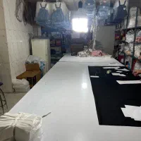 کارگر و بسته بندی پوشاک