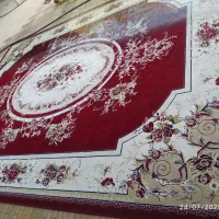 بوفه زیر تلوزیون. فرش.کتری قوری.کیف . در ملکشای