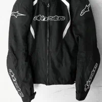 کاپشن موتورسواری ریس کراس آلپین استار