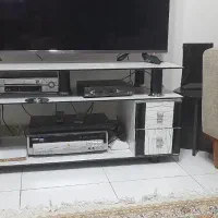 میزتلویزیون شیشه ایی ۸میل با۴کشو