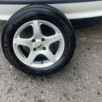 رینگ و لاستیک ۵ پره پژو و سمند ۴ حلقه ۲۰۵/۶۰/۱۵