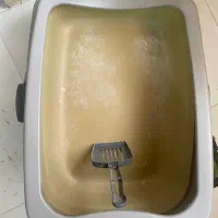 ظرف خاک گربه به همراه بیلچه