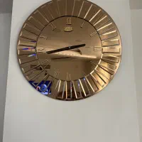 ساعت دیواری ایینه ای
