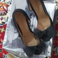 کفش|کیف، کفش، کمربند|اهر, |دیوار