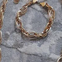 سرویس گردنبند گوشواره ودستبند رنگ ثابت
