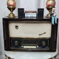 خریدار رادیو لامپی تلویزیون بوفه قدیمی ساعت مجسمه