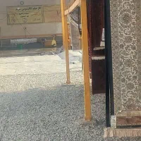 کارگر ساده در کارخانه قالیشویی