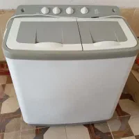 لباس شویی دو قلو