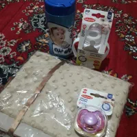 حوله بچه شیشه شیر پستونک دهنی