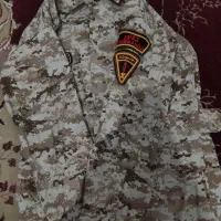 لباس نظامی خاکی|لباس|تربتحیدریه, کاشانی|دیوار