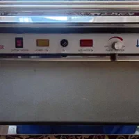 یک عدد دستگاه سلفون کش و یک عدد فن هواکش بزرگ|پنکه و تصفیهکنندهٔ هوا|تبریز, |دیوار