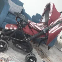 کالسکه نو تر تمیز داخل پلاستیک نینی لای لای داره