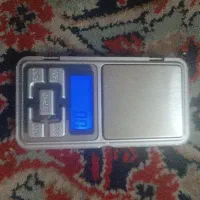 ترازو گرم کش