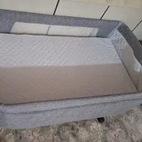 گهواره کنار مادر