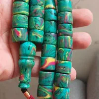تسبیح کهربا. تراش قیچی بر. وزن ۱۲۵ گرم