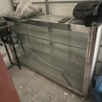 میز ویترین استیل ۴طبقه شیشه ۱۰سانتی