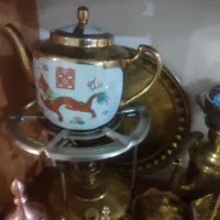 منقل برنجی قدیمی.لطفان ورق بزنید.معاوضه وفروش. .