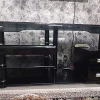 میز تلویزیون شیشه‌ای مشکی شیک و مقاوم