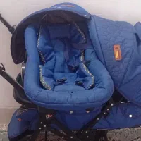 لوازم نوزاد کرییه کالسکه روروءک موزیکال تاپ