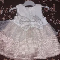 لباس بچگونه|کفش و لباس بچه|اهواز, زندوکیلی|دیوار