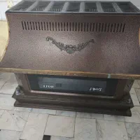 بخاری سایز بزرگ بسیار تمیز و لوازم و شمعک نو نو