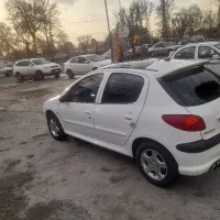 پژو ۲۰۶ تیپ ۳ پاناروما سقف شیشه ای مدل ۱۴۰۲ کم کار