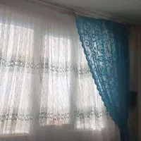 پرده توری گلدوزی شده