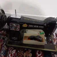 چرخ خیاطی و بخاری