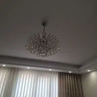 لوستر کریستال 9 شعله با لامپ کم مصرف لوسر