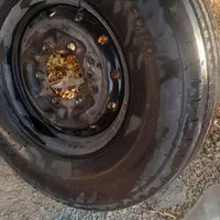 فروش یه جفت لاستیک سیمی تیوپلس عقب نیسان با رینگ|قطعات یدکی و لوازم جانبی|بندر کنگان, |دیوار