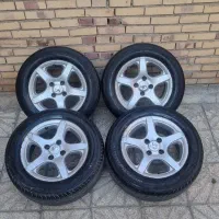 یک دست رینگ پنج پر با لاستیک سایز 15/205با معاوضه