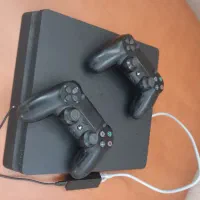 ps4 اسلیم یک ترابایت کپی خور شده همراه با دو دسته