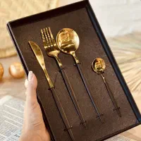 ست سرویس قاشق وچنگال ۶نفره۲۴پارچه طلایی دسته مشکی