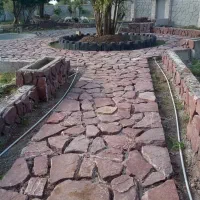 اجرای محوطه سازی  سنگ کوهی آبنما و کارهای بنای