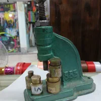 دستگاه پرس دکمه