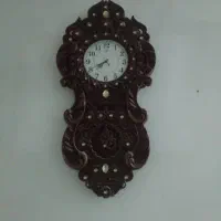 وسایل منزل میز تلویزیون و ساعت دیواری