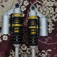 یک جفت کمک موتور سیکلت بادی