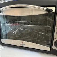 توستر در حد نو بدون حتی یه لکه یا جرم