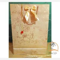 ساک دستی طلا کوب با کفی ضخیم و بند کرافت طلایی
