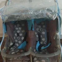 کالسکه دو قلو و کاور